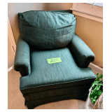 Dark Green Upholstered Armchair with Skirted Base