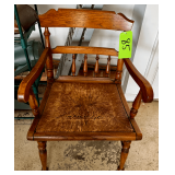 Wood Armchair with Woven Seat Featuring Spindle Backrest