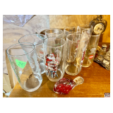 Vintage Household Items Including Sewing Table, Glassware, Brass Candle Holders, and Decorative Clock