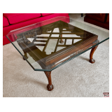 Glass Top Wooden Coffee Table with Carved Details and Claw Feet