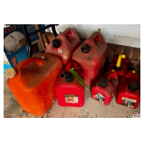 Six Plastic Fuel Cans
