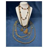Five Gold Tone Necklaces