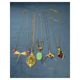 Five Gold Tone Necklaces in Various Designs
