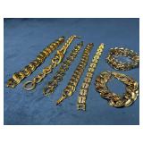 Seven Chunky Gold Tone Link Bracelets