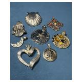 Eight Decorative Pendants in Varied Styles