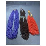 Three Substantial Beaded Necklaces with Decorative