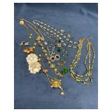 Jewelry Lot with Necklaces, Earrings, and Brooches