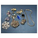 Eleven Silver Tone and Stone Pendants with Braided