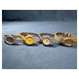 Four Elegant Wrist Watches in Mixed Metals