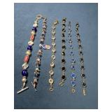 Six Sparkling Bracelets with Gold and Beaded Desig