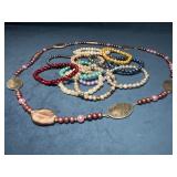 13 Dyed Pearl Bracelets and One Necklace