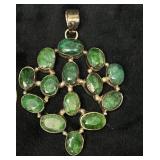 Gold-Toned Emerald-Colored Gemstone Pendant