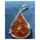 Amber Stone Wrapped Pendant in Silver Setting