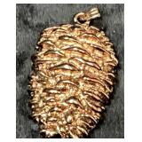 Unmarked Gold-Tone Pendant with Textured Finish