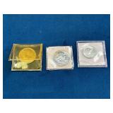 Three U.S. Coins in Protective Cases