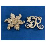 Two Brass Trivets with Decorative Designs
