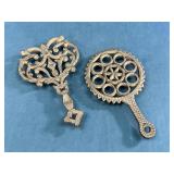 Ornate Cast Iron Trivets with Decorative Design