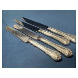 Two Pairs of Dinner Knives with Sterling Silver Ha
