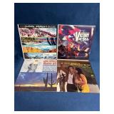 Four Vinyl Records Featuring Various Artists and