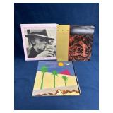 Three Vinyl Records Featuring David Bowie and More