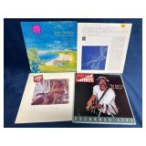 4 Vinyl Records Including Jimmy Buffett and David