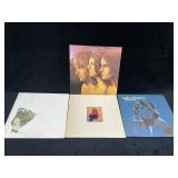 Four Vinyl Records Featuring Classic Artists