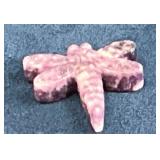 Small Pink Dragonfly Figurine on Light Blue Surfac
