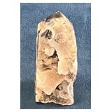 Small Natural Rock Formation with Embedded Feature