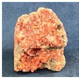 Small Orange Mineral Specimen with Rough Texture