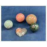 Five Polished Stone Spheres and Leaf Carving