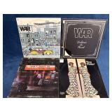 Four Vinyl Records: War, Elton John, and Dionne Wa