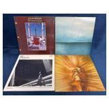 Four Vinyl Records by Lee Ritenour, Ramsey Lewis,