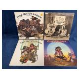 Four Vinyl Records Including Three Pure Prairie Le