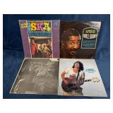 Four Vinyl Records Featuring Jazz, Ska, and Fusion