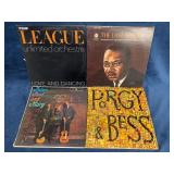 Four Vinyl Records Featuring Various Artists