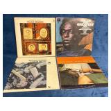 4 Vinyl Albums Including Miles Davis and Wes Montg