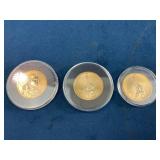 Three Gold or Gold-Plated Commemorative Coins with