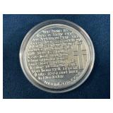 .999 Silver Coin Featuring Religious Text and The