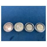 Four State Quarters in Protective Capsules