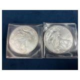 Two 1 oz .999 Fine Silver American Eagle Coins in