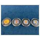 Four U.S. Presidential Commemorative Coins in Disp