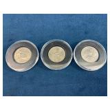 Three State Quarters in Protective Cases