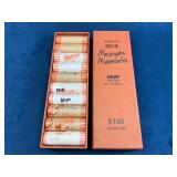 $100 in Rolled Quarters