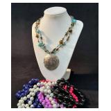 Beaded Necklaces Featuring Monogram Pendant and Mu