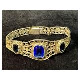 Silver-Tone Filigree Bracelet with Blue Glass Ston