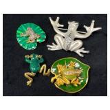 Four Art Pins Featuring Frog Designs on Enamel and