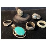 Six Jewelry Pieces Including Rings and Pendant