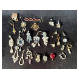 Single Earrings and Charms in Mixed Materials and