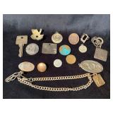 Small Metal Items Including Key, Tokens, and Chain