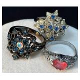 Three Ornate Rings with Gemstone Accents